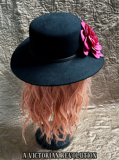 Black Wide Brimmed Hat with a Fuchsia Flower