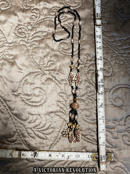 Vintage 1970s Faux Bone Charm Necklace – Retro Resin Folk Art Style Statement