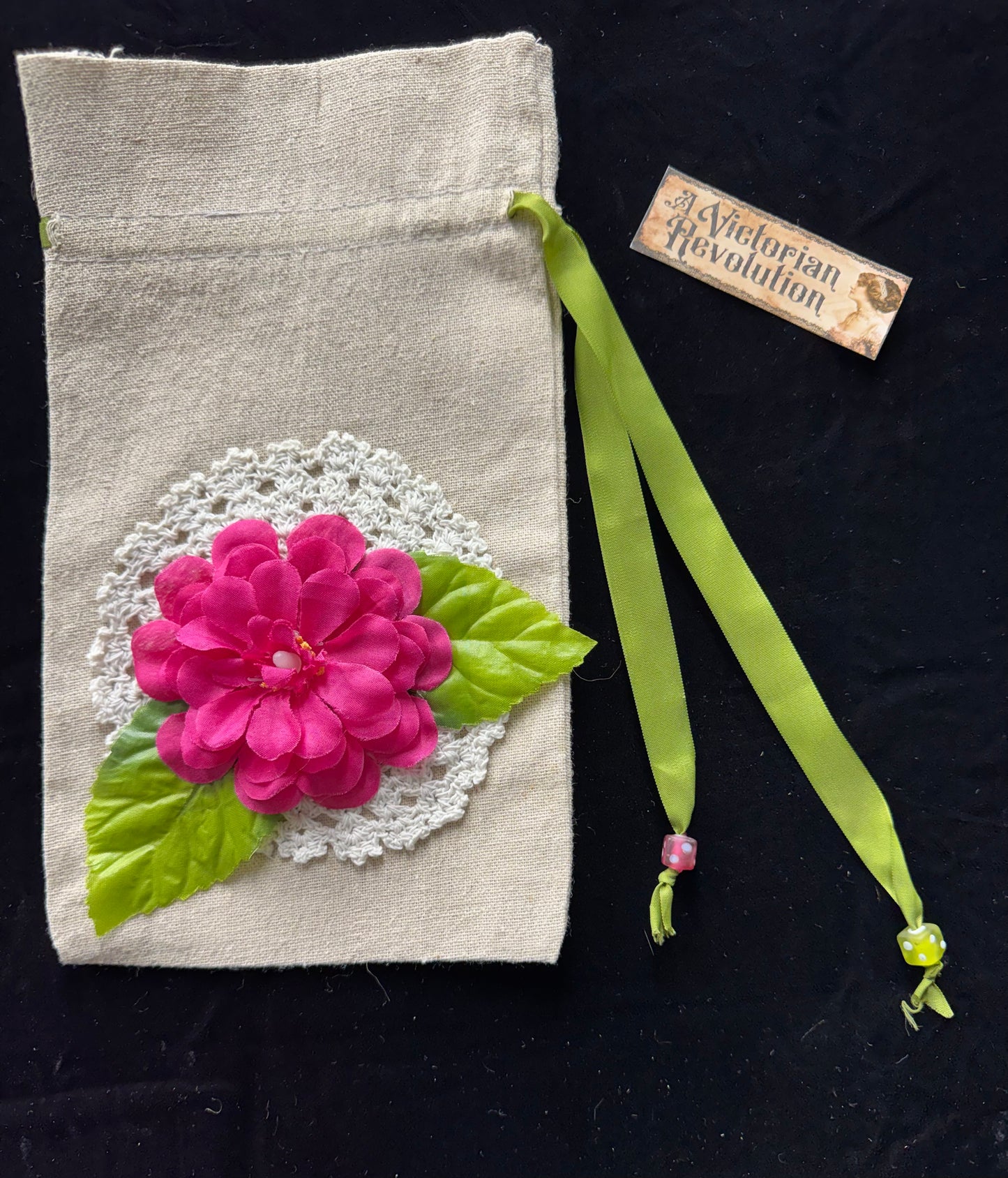 Drawstring bag with pink flower