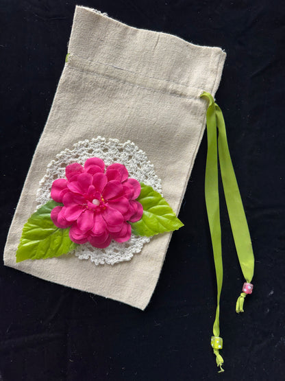 Drawstring bag with pink flower