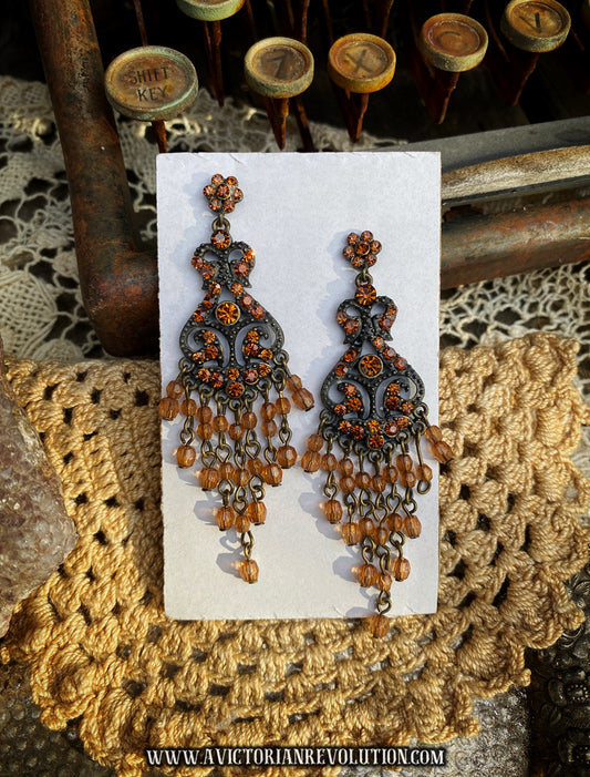 Amber Colored Chandelier Earrings - Ornate Bronze Filigree - Pierced Dangles with Orange Rhinestones - Vintage Style