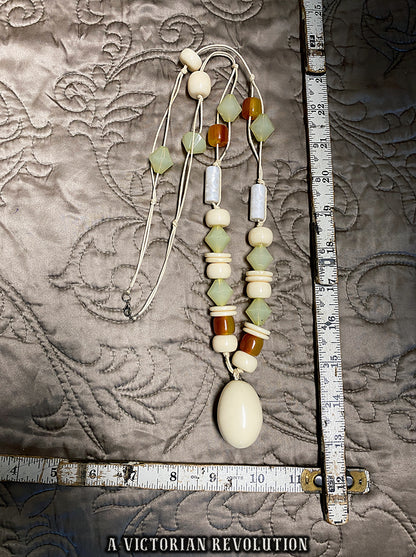 Vintage 1970s Art Deco Revival Knotted Bead Necklace with Cream Amber + Green Beads