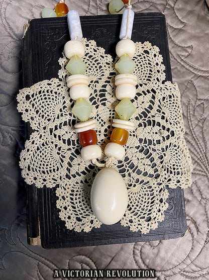 Vintage 1970s Art Deco Revival Knotted Bead Necklace with Cream Amber + Green Beads