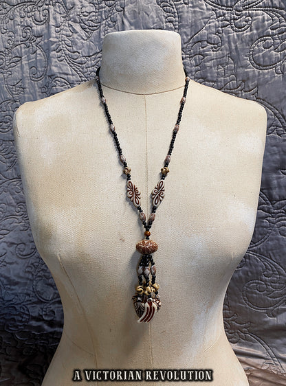 Vintage 1970s Faux Bone Charm Necklace – Retro Resin Folk Art Style Statement