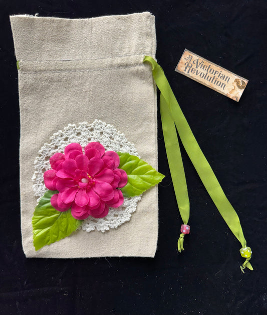 Drawstring bag with pink flower