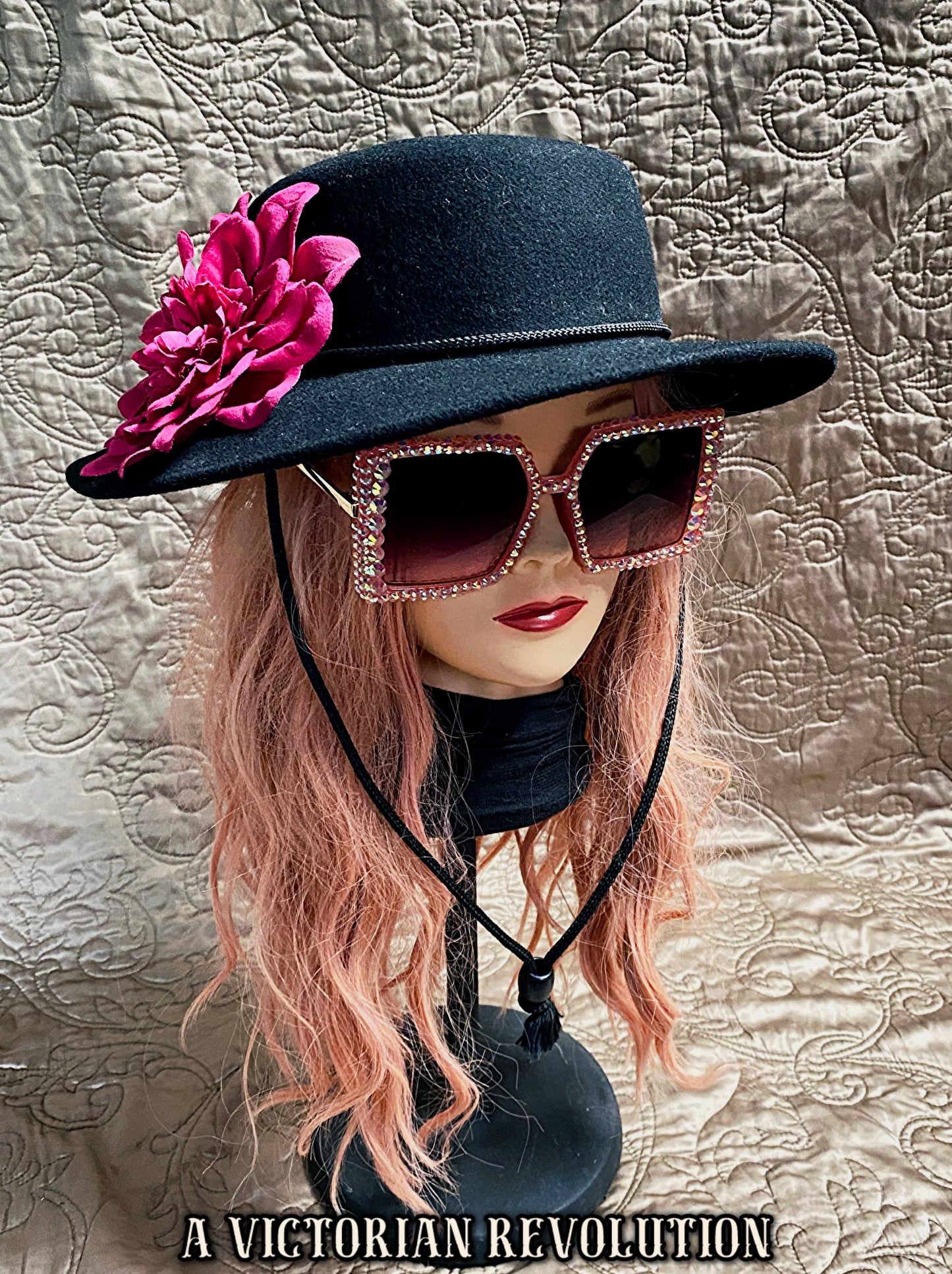 Black Wide Brimmed Hat with a Fuchsia Flower