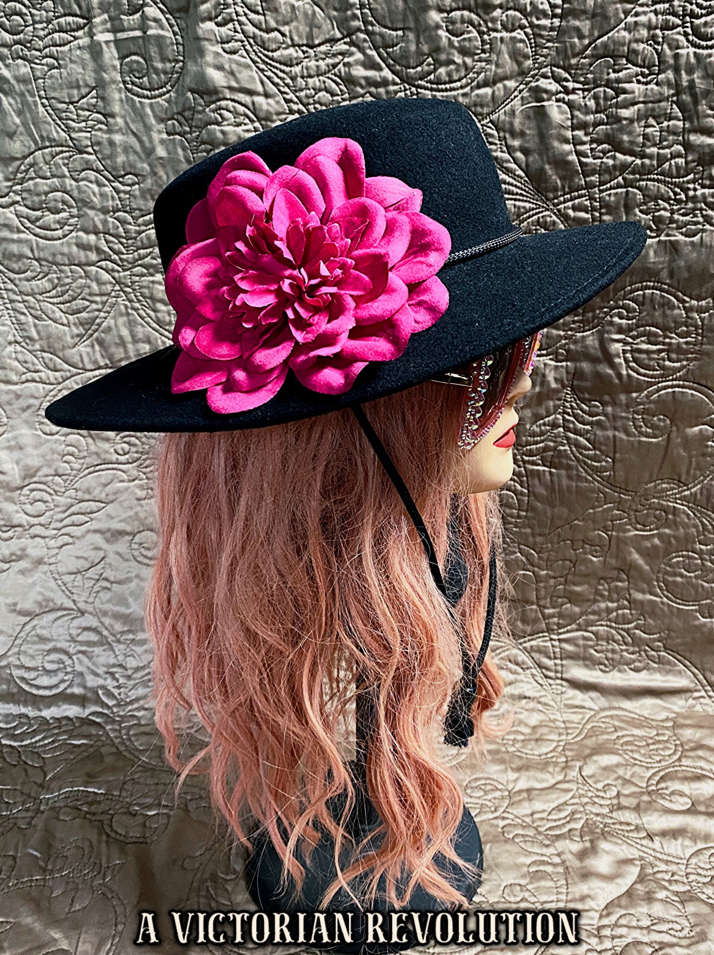 Black Wide Brimmed Hat with a Fuchsia Flower