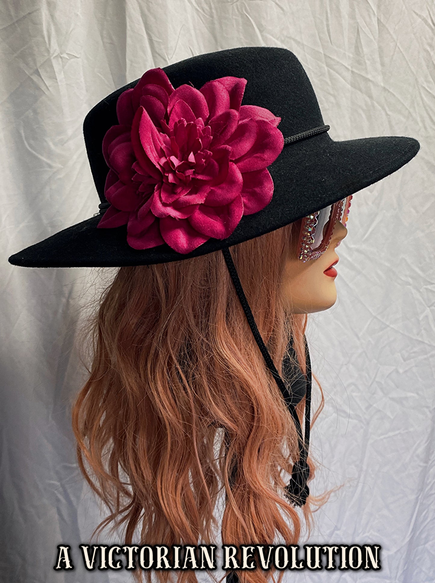Black Wide Brimmed Hat with a Fuchsia Flower
