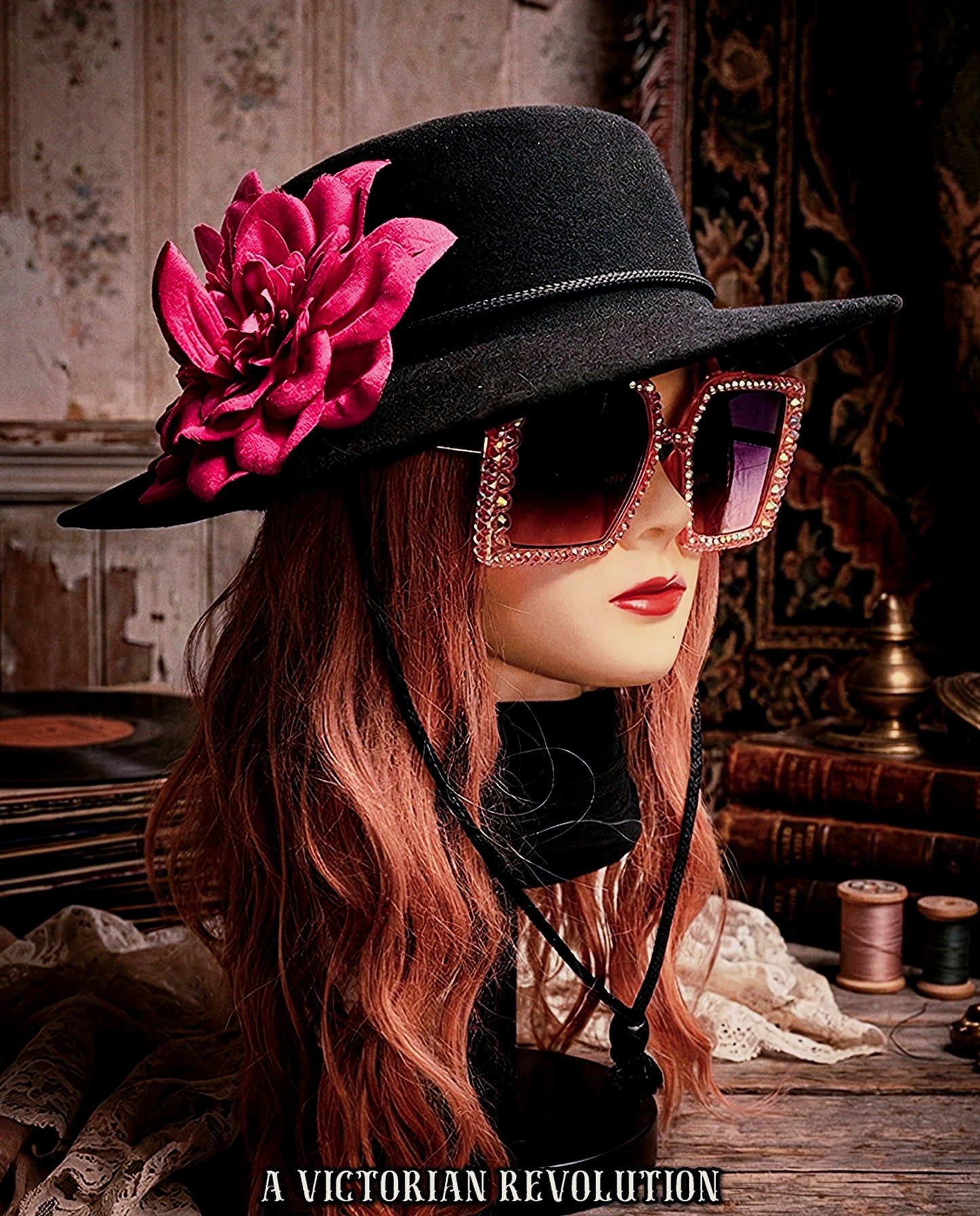 Black Wide Brimmed Hat with a Fuchsia Flower