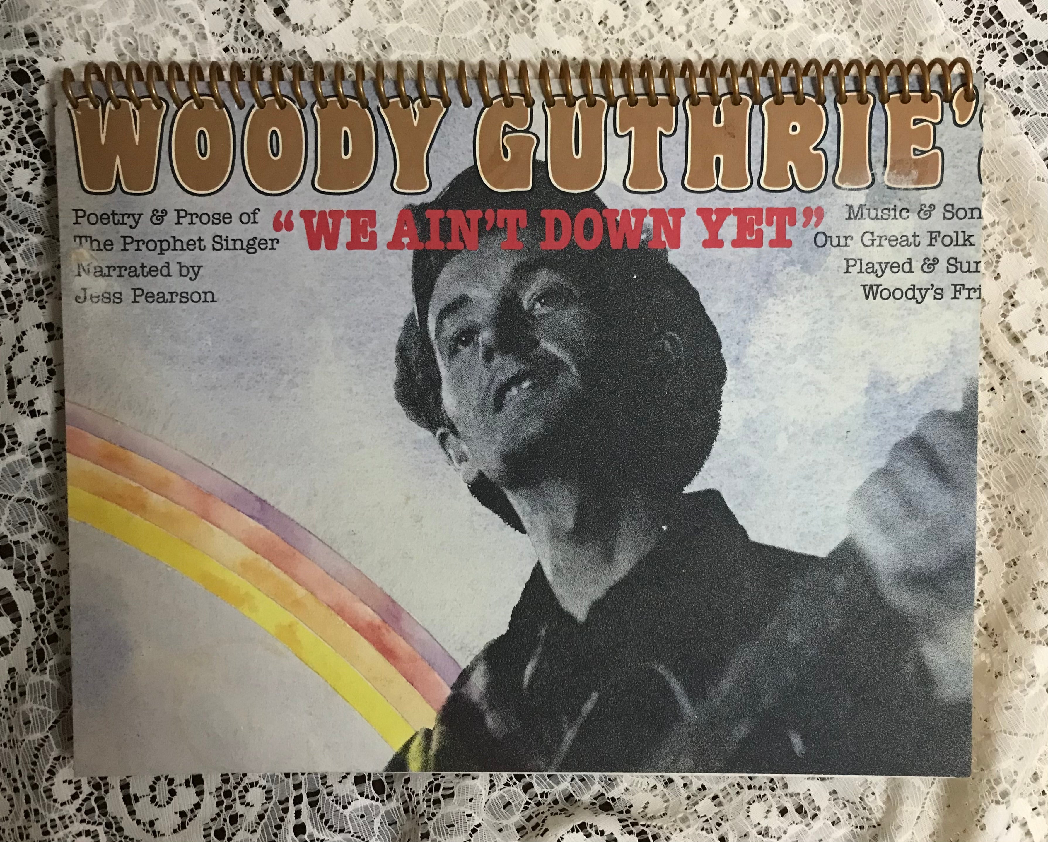 Woody Guthrie Album We Ain’t Down Yet Cover Notebook